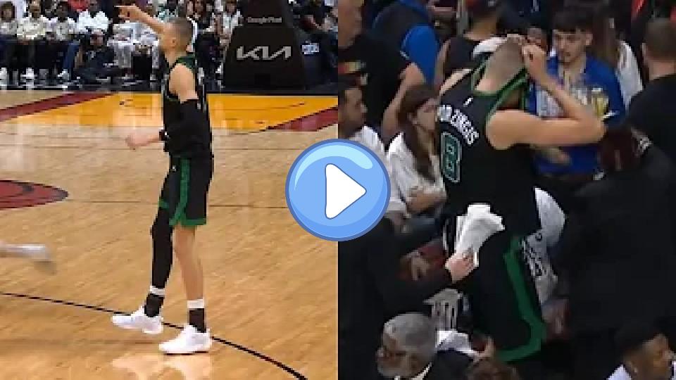 Video thumb: Kristaps Porzingis puts his jersey over his head after a scary non-contact leg injury against the Heat. 😬