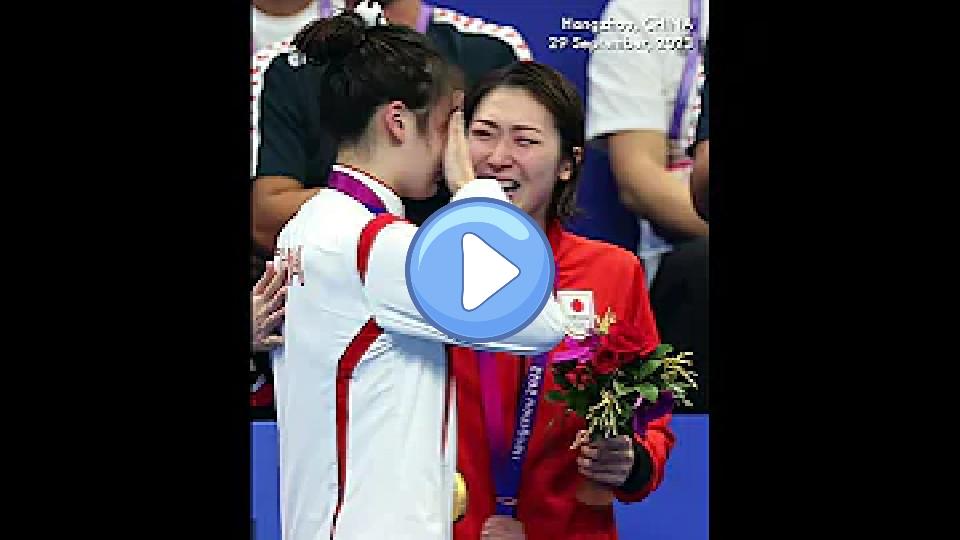 Video thumb: Chinese swimmer Zhang Yufei and Japanese swimmer Rikako Ikee share tearful hug on Asian Games podium.