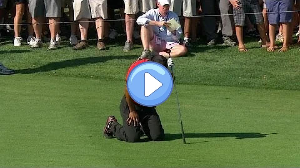 Video thumb: Tiger Woods drops to his knees in pain during the final round of The Barclays.