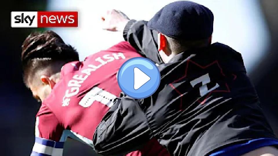 Video thumb: Watch the moment when Aston Villa captain Jack Grealish is punched by a Birmingham City fan.