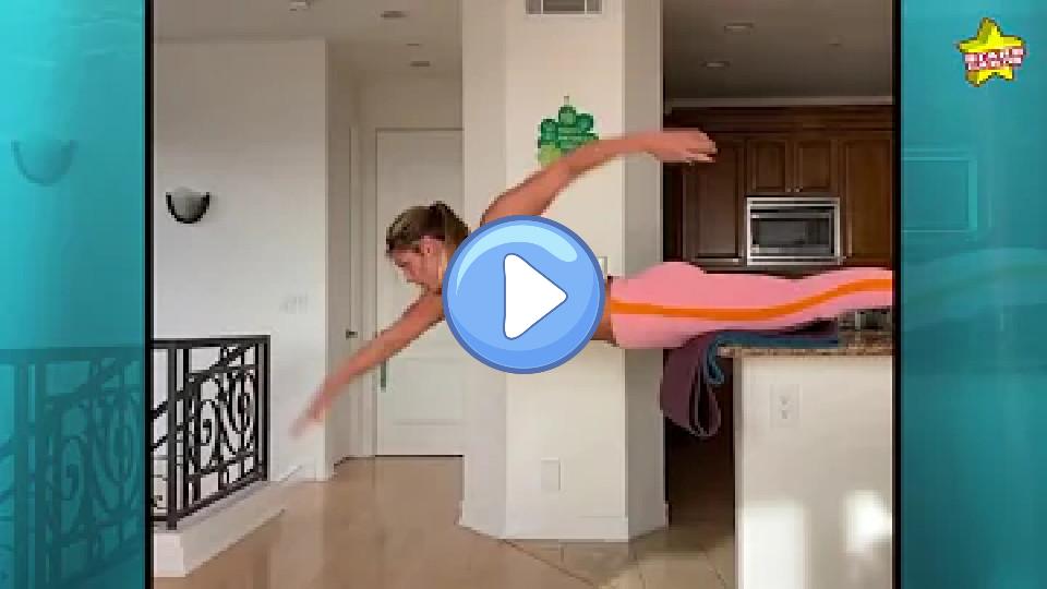 Video thumb: Russian Olympic swimmer Yulia Efimova flaunts toned abs during an at-home kitchen workout.