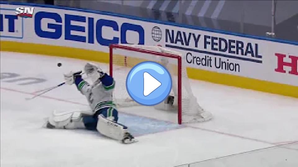 Play video: Markstrom dives back into the crease for a desperate save. Video thumb: Markstrom dives back into the crease for a desperate save.
