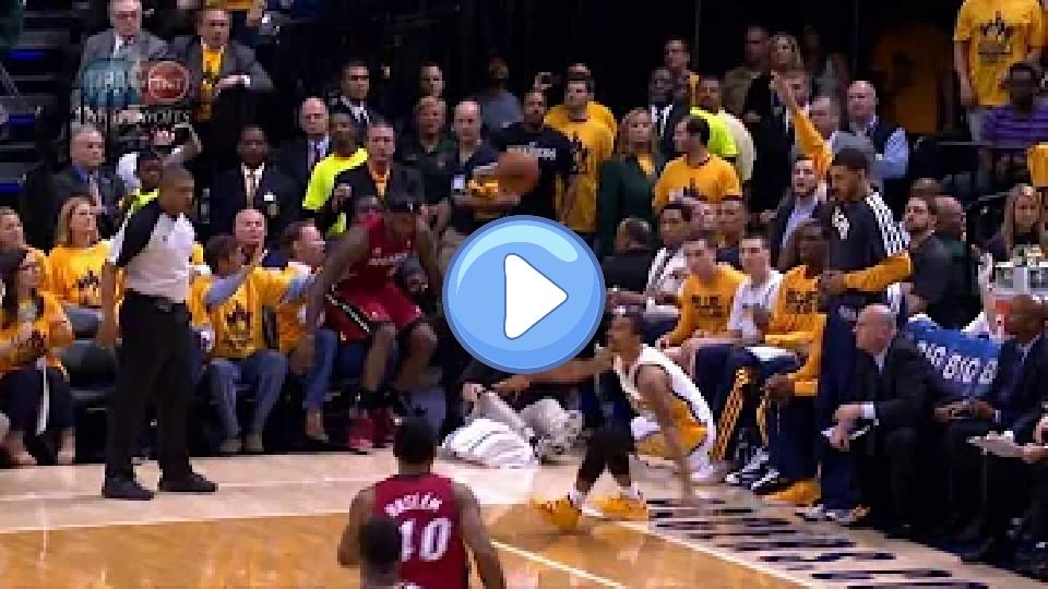 Video thumb: LeBron James falls into Shaq's lap!